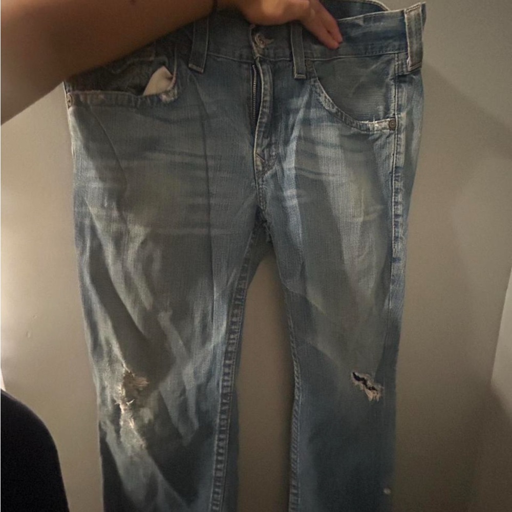 Distressed Light Blue Jeans